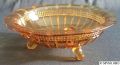 wetherford-0168-half_7_3qtrs_in_3footed_bowl_flat_rim_eng39_amber.jpg