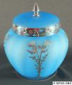 1920s-0507_2pc_urn_jar_and_cover_rockwell_thistle_w-enamel_shapes_bluebell_frosted.jpg
