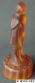 1920s-0513_12half_in_figure_flower_holder_(draped-lady)_amber_frosted.jpg