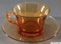 1920s-0933_cup_and_481_6in_saucer_(round-line)_amber.jpg